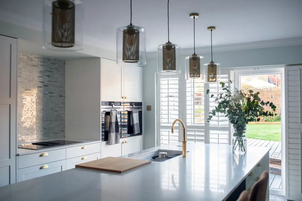 modern kitchen with island and gold accents